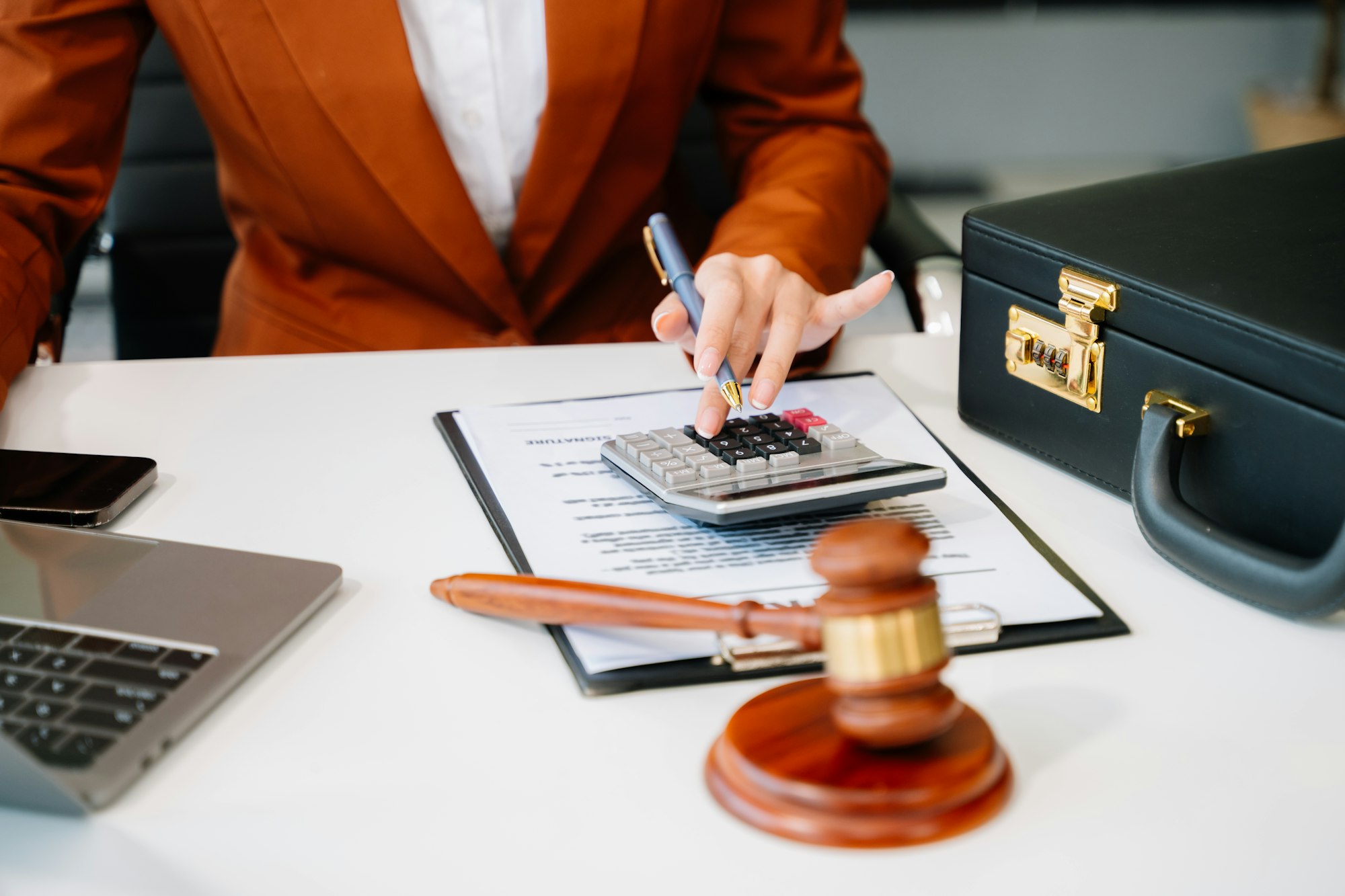 justice and law concept. Male judge in a courtroom the gavel, working